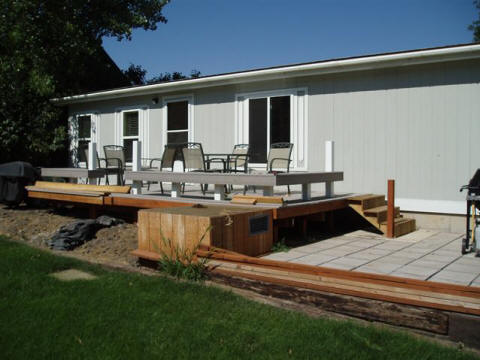 Deck of The River House Guest House